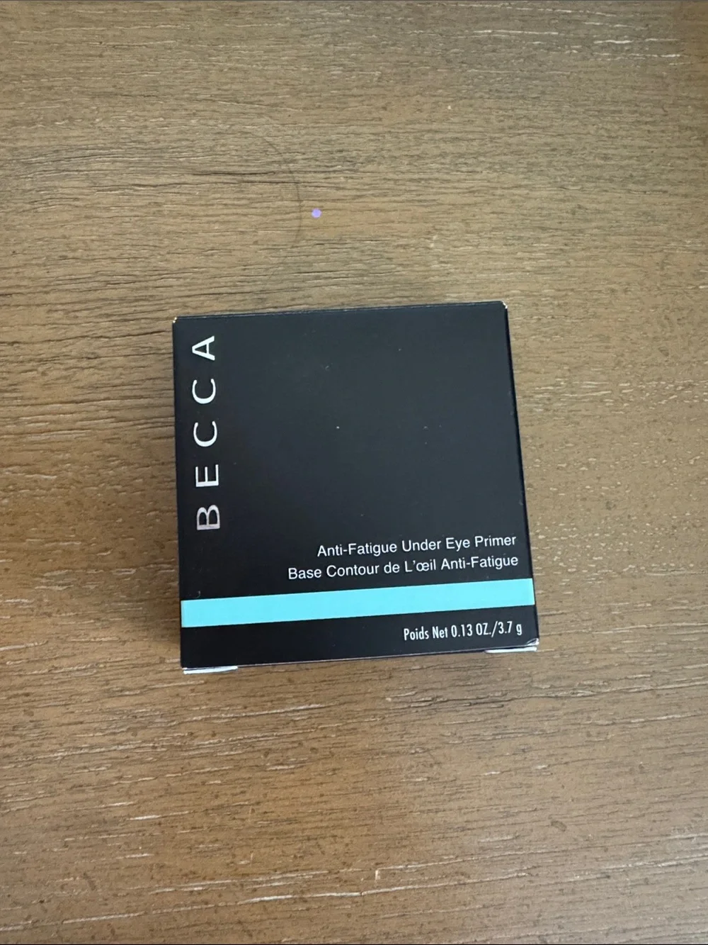 BECCA Anti-Fatigue Under Eye Primer — Black with Aqua Accent